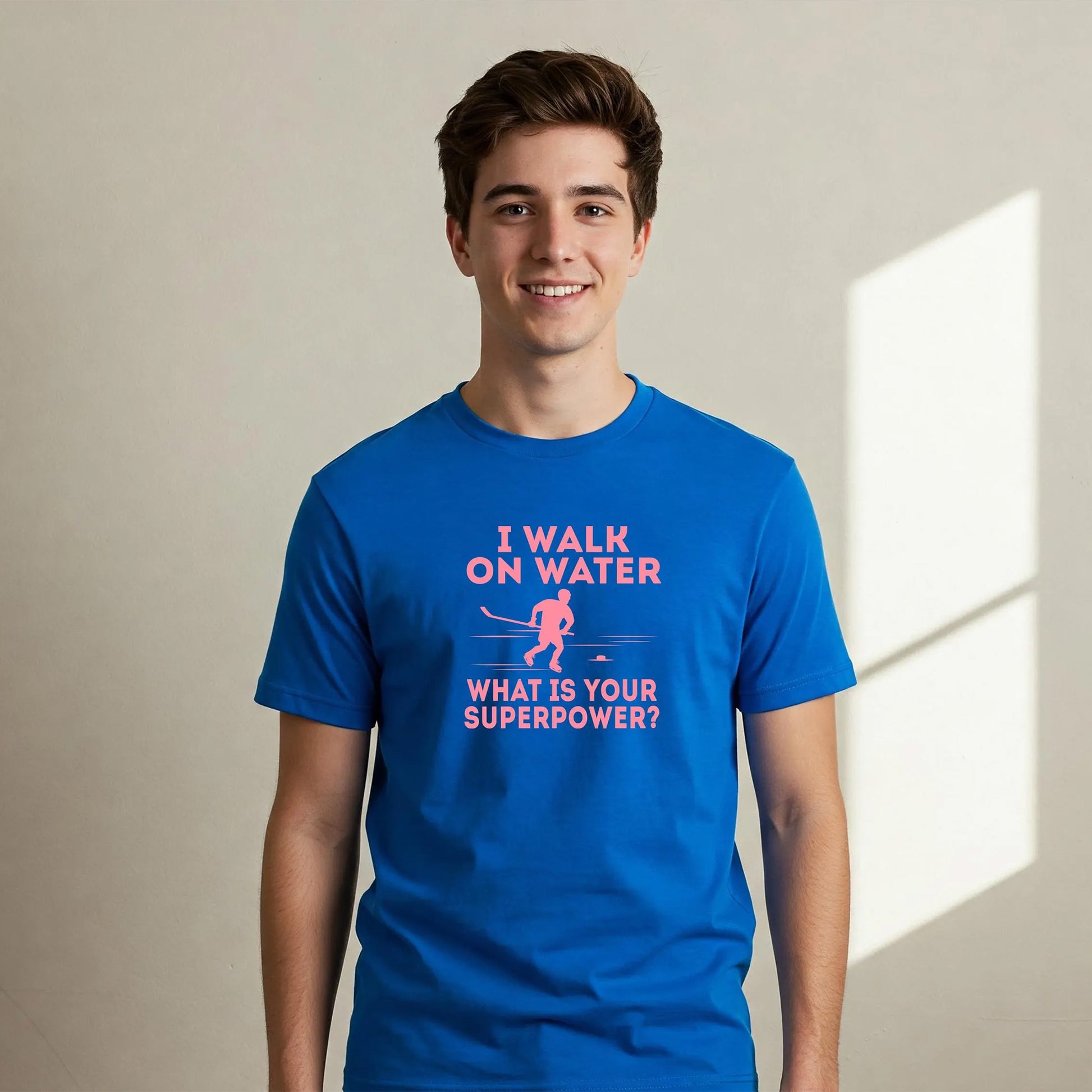 Person wearing a blue t-shirt with a humorous graphic and text.