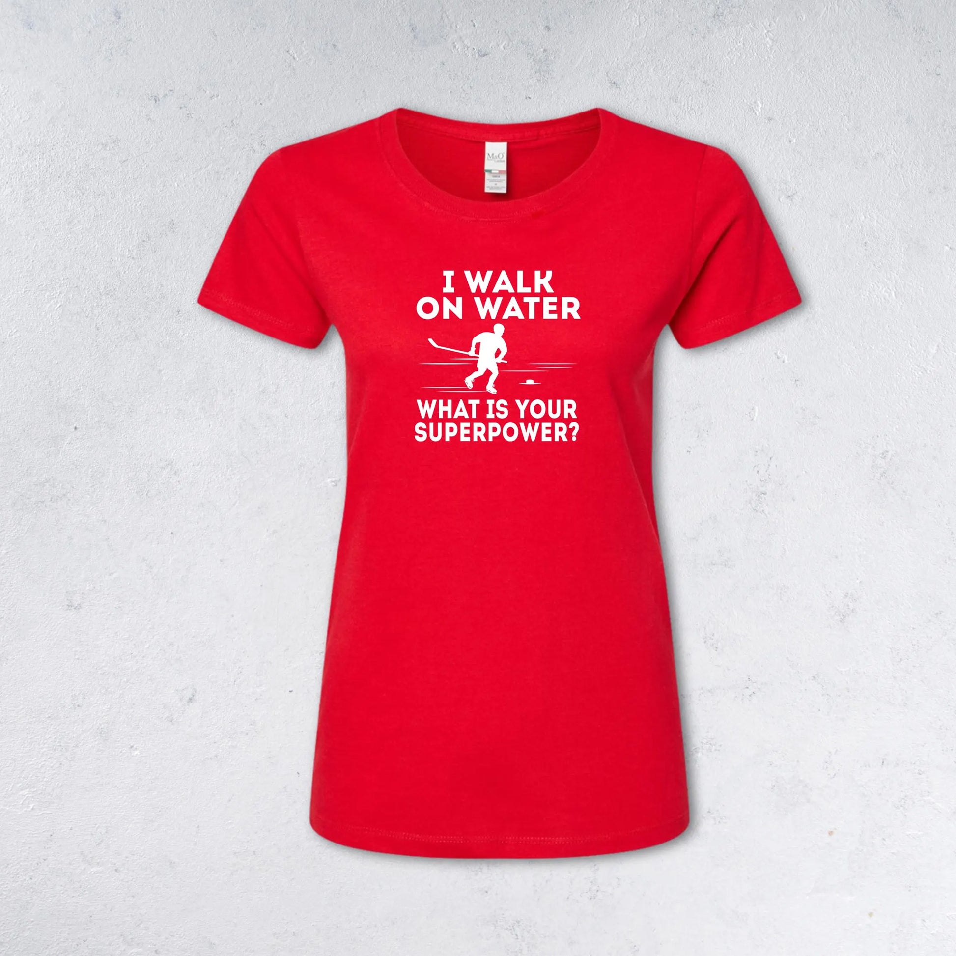 Red t-shirt with humorous graphic and text on a light gray background