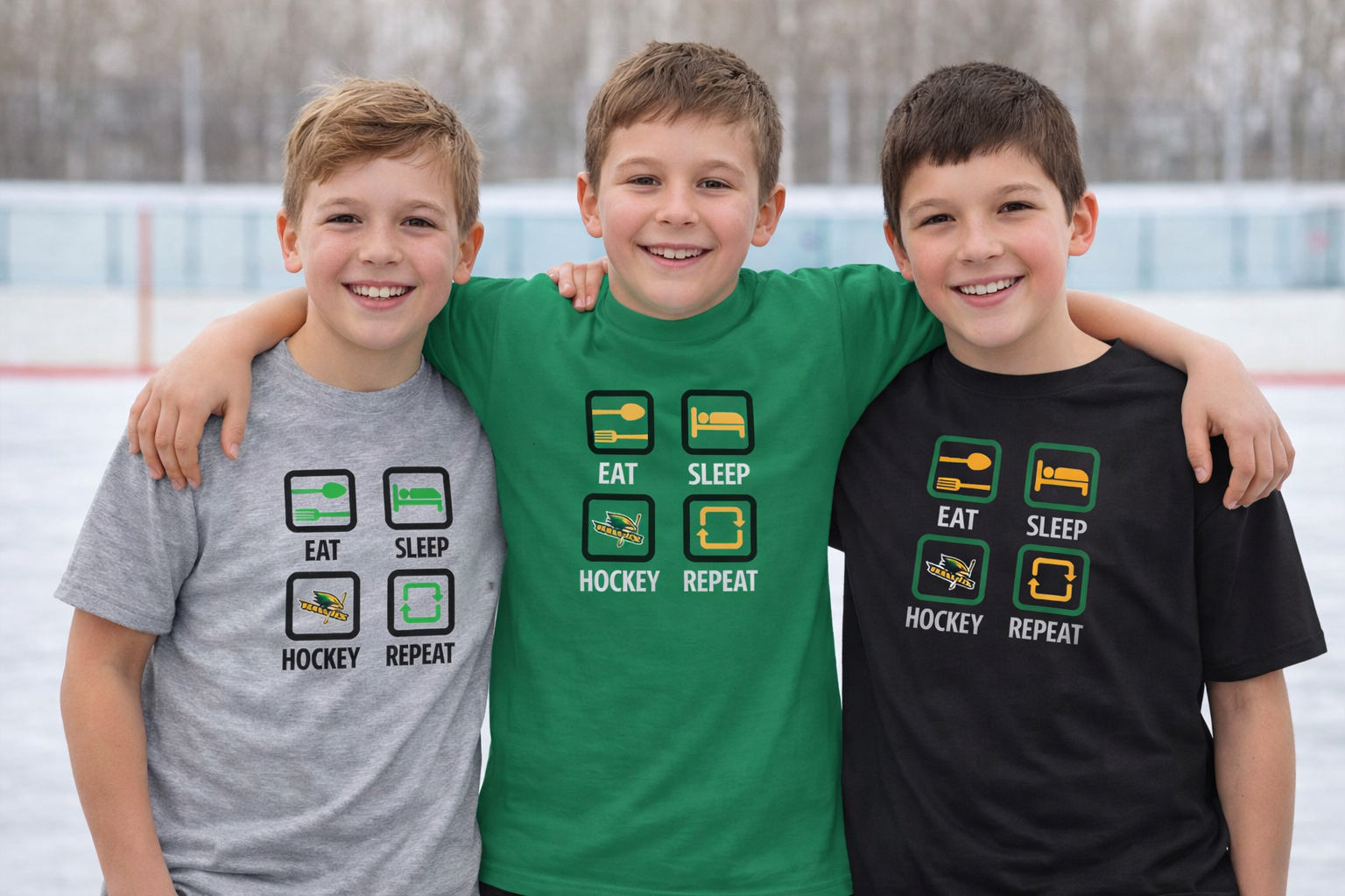 Three boys wearing leitrim hawks t-shirts with hockey-themed designs on an ice rink.