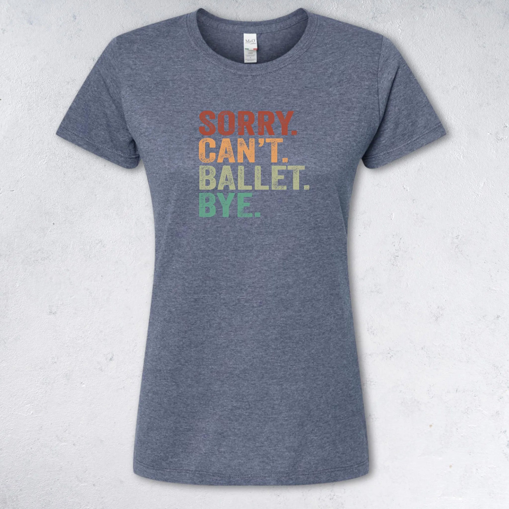 Gray t-shirt with colorful text 'SORRY. CAN'T. BALLET. BYE.' on a light gray background