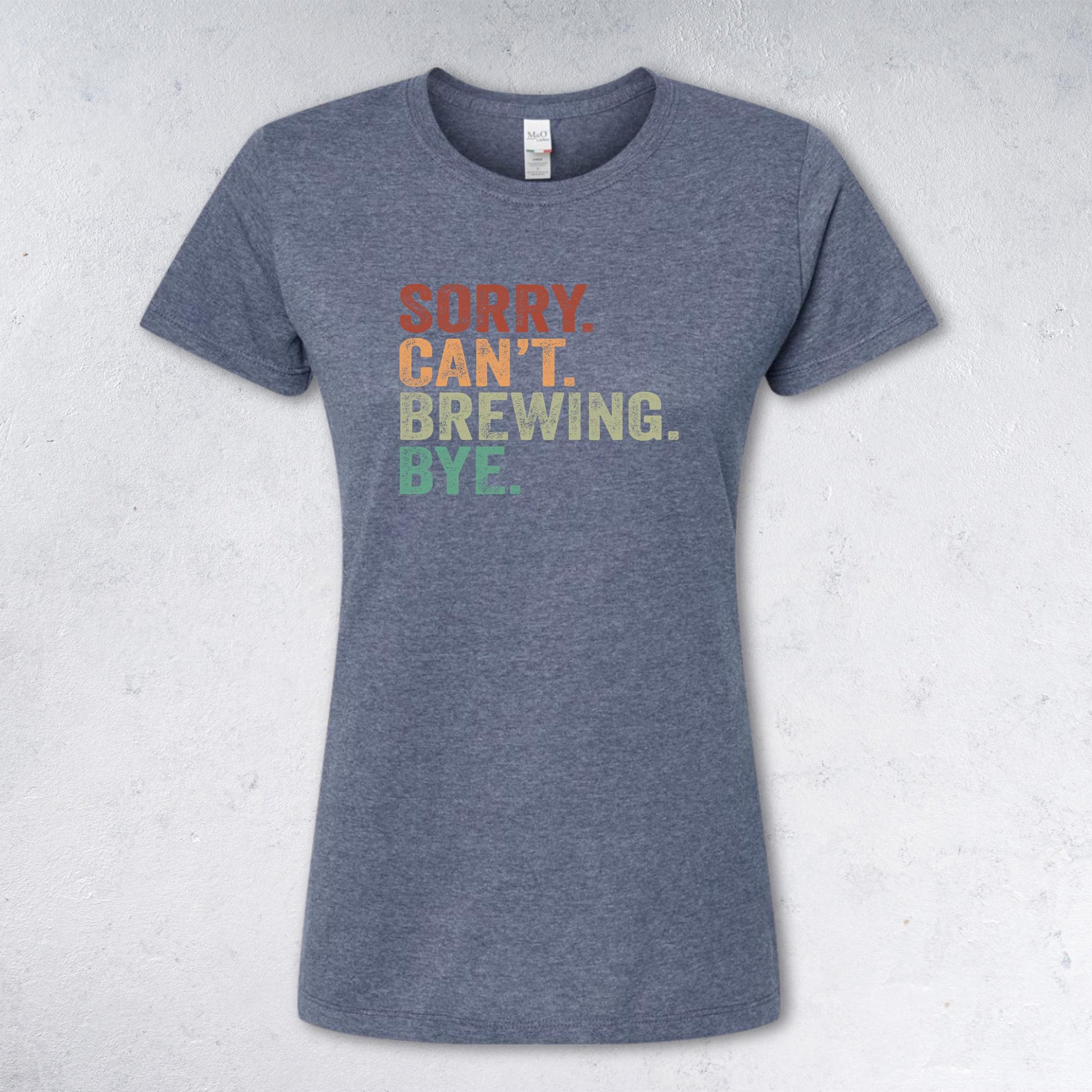 Gray t-shirt with colorful text 'SORRY CAN'T BREWING BYE' on a light gray background