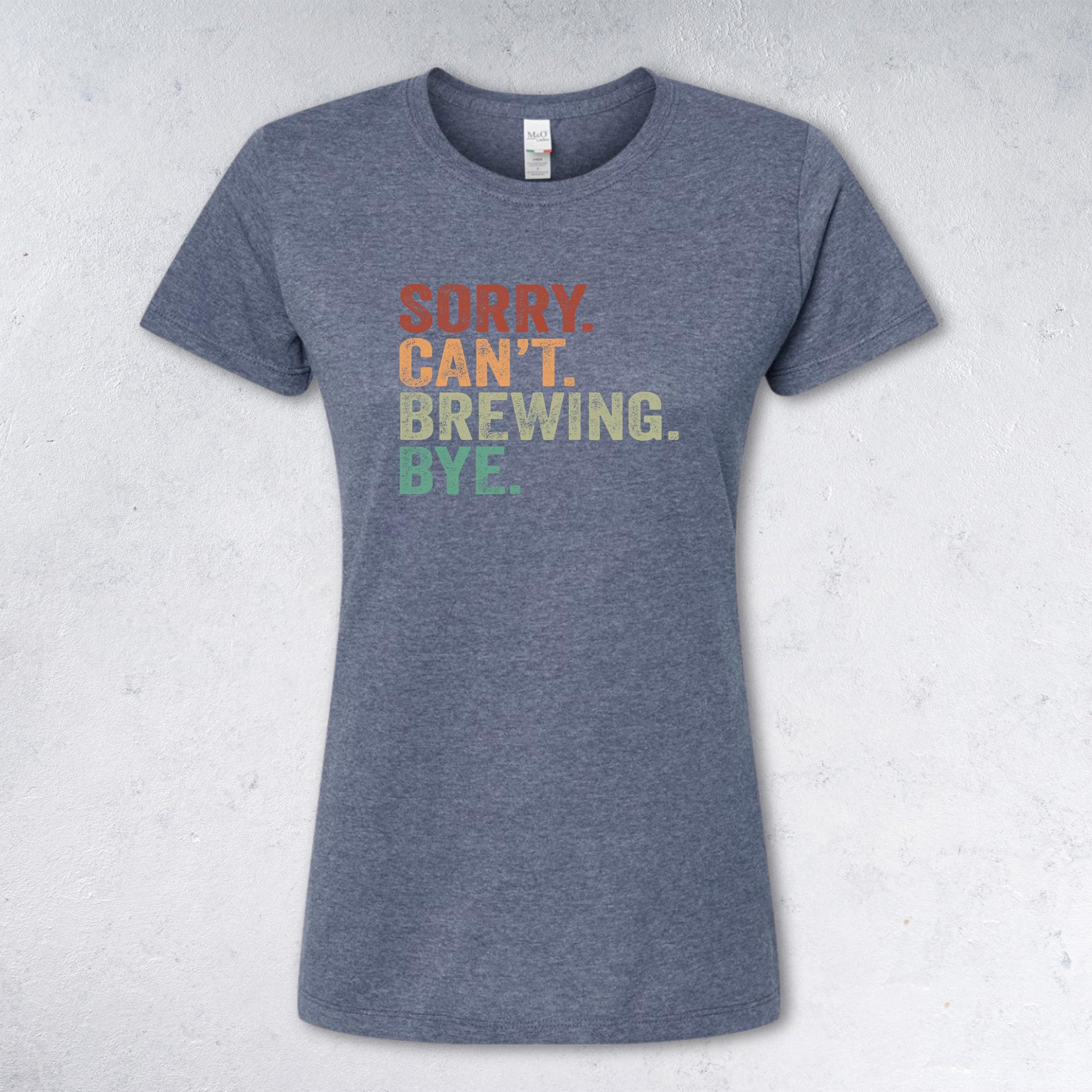 Gray t-shirt with colorful text 'SORRY CAN'T BREWING BYE' on a light gray background