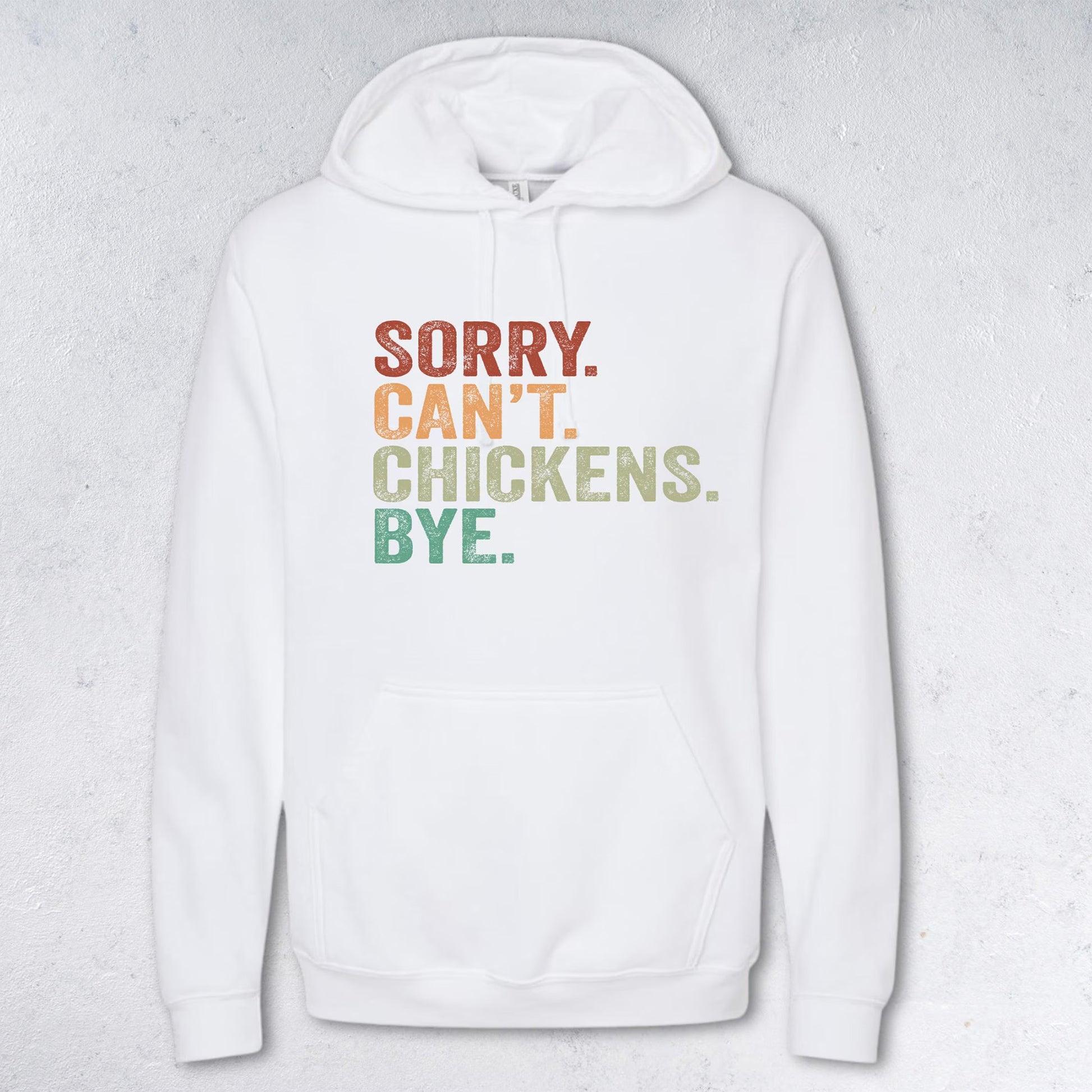 White hoodie with colorful text on a light gray background