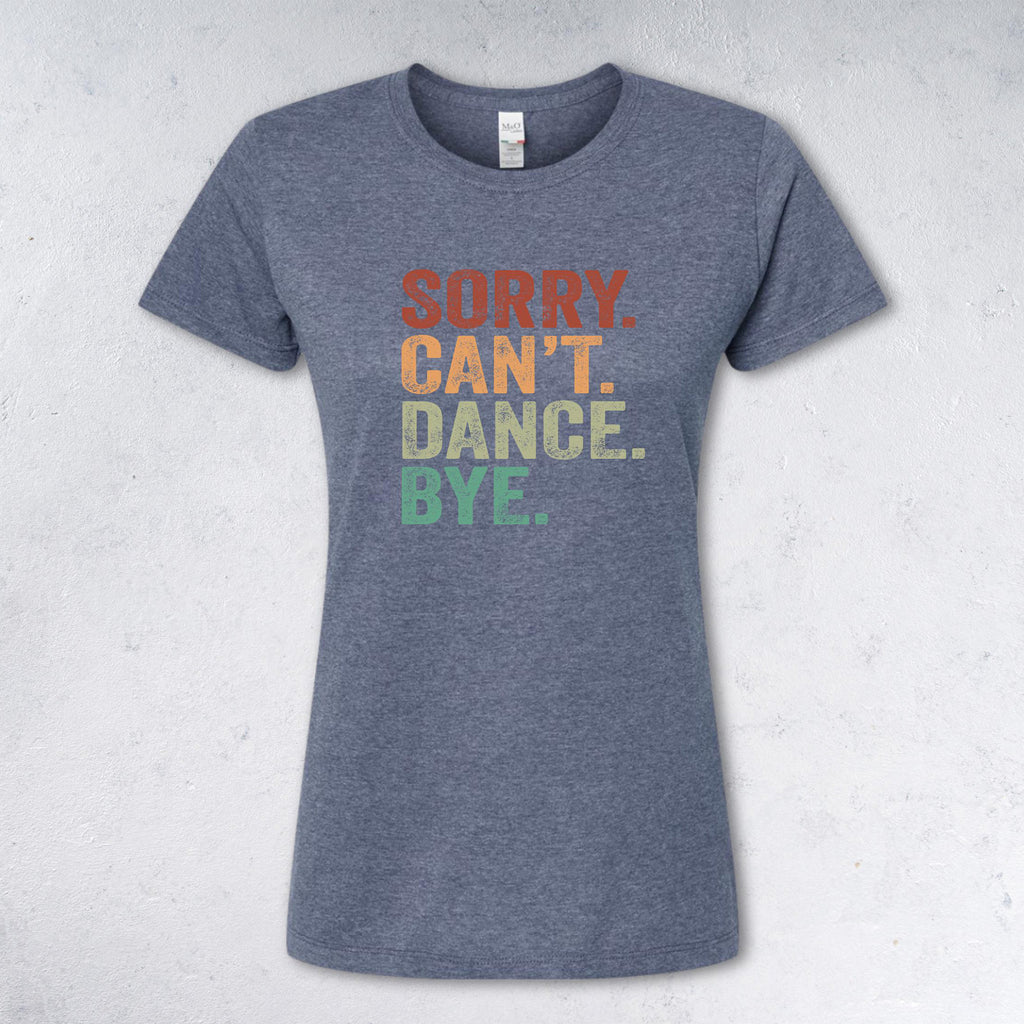 Blue t-shirt with colorful text 'SORRY. CAN'T. DANCE. BYE.' on a light BLUE background