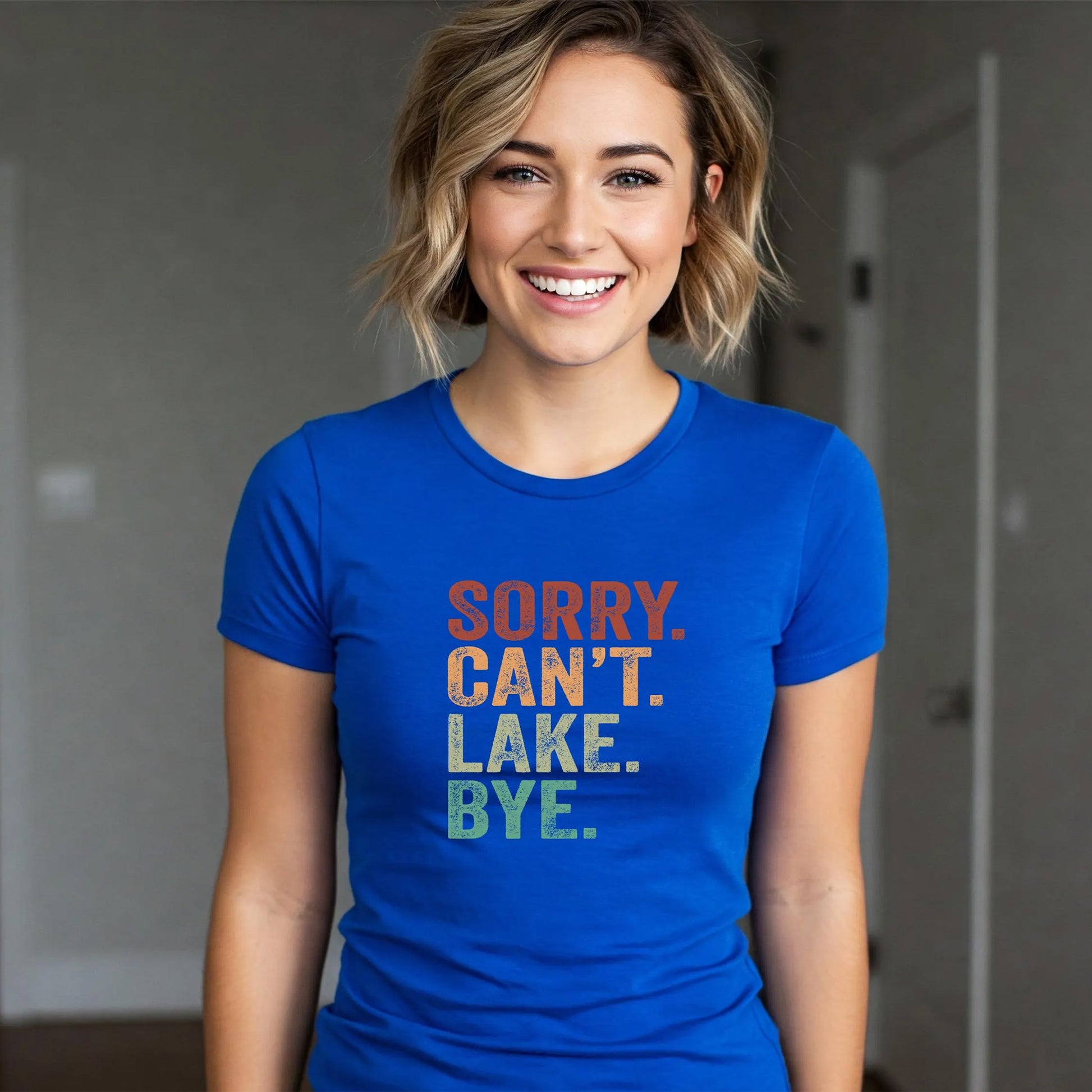 Person wearing a blue t-shirt with humorous text design.