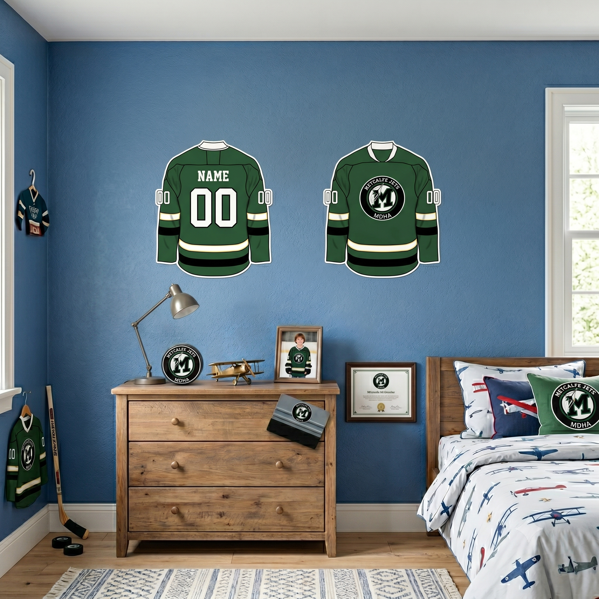 Children's bedroom with hockey-themed decor, including jerseys on the wall and sports-themed bedding.